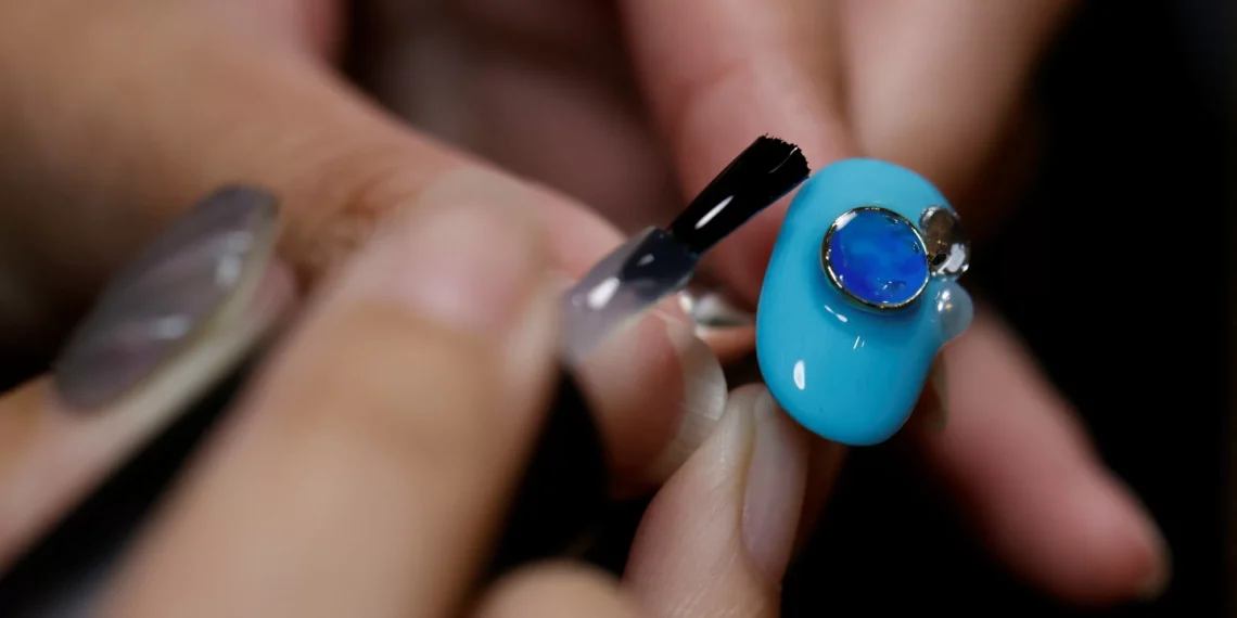 Manicurist turns beach plastic into nail art to raise awarenes