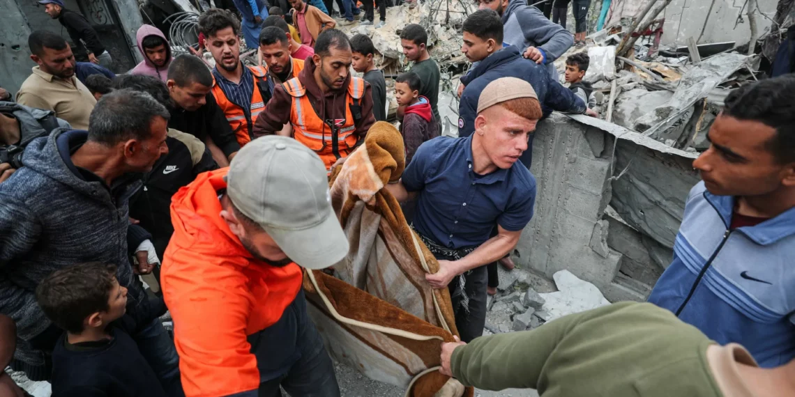 Israel steps up pressure on Gaza, strikes hospital on Palm Sunday