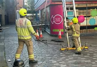Moment part of roof at derelict Debenhams building crashes to ground