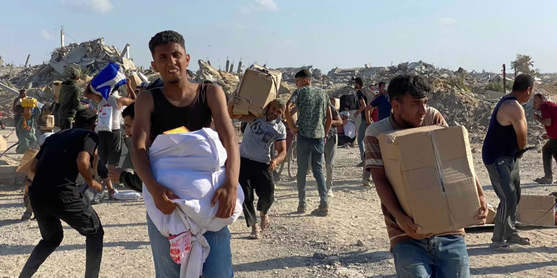 Israel fires on starving Gazans rushing to US aid center