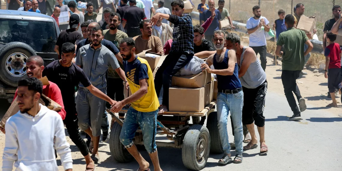 Hungry Gazans scramble for aid as cease-fire talks crawl forward