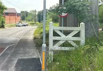 Kent village left with no name after developers take down sign