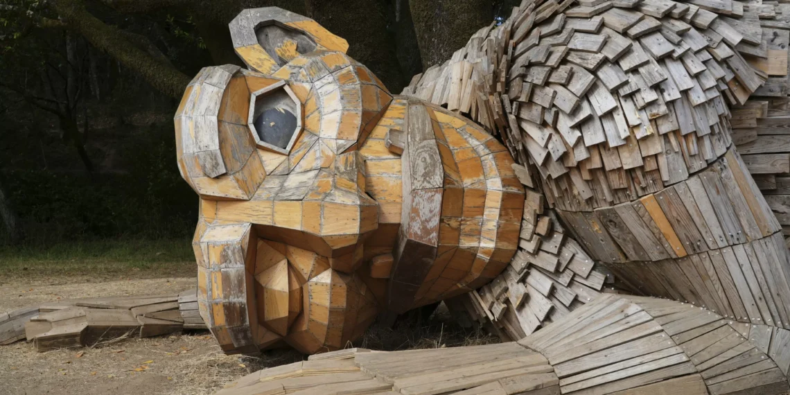 Wooden trolls made from trash urge humans to protect planet
