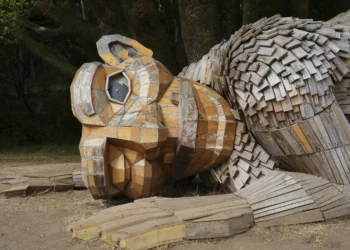 Wooden trolls made from trash urge humans to protect planet