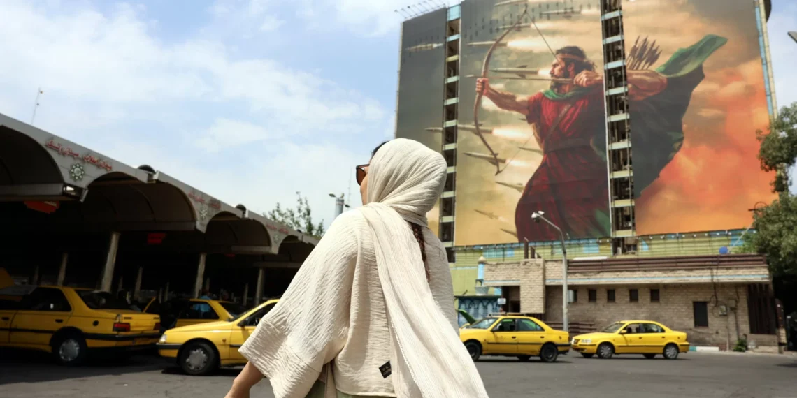 Iran adamant on enrichment but warns against reimposing sanctions