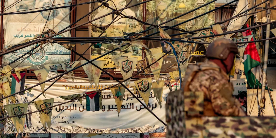 Palestinian groups start surrendering weapons at Beirut refugee camp