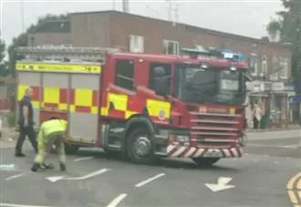 Emergency services scrambled to crash on main road