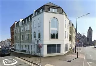 Flats approval on former car wash site ‘will add to area’s overpopulation woes’