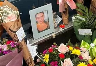 Floral tributes laid outside restaurant for ‘much-loved’ employee