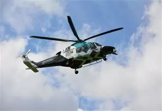 Air ambulance lands after car and motorbike collide