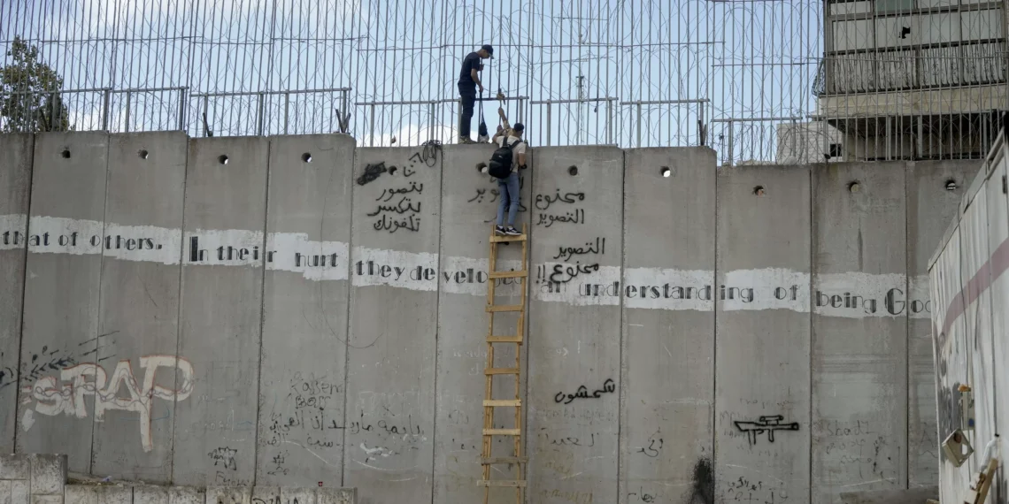 Israel Revoked a Palestinian’s Work Permit. When He Tried to Cross the Wall, They Shot Him and Left Him to Die.