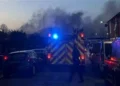 Smoke billows from business as fire crews descend on blaze